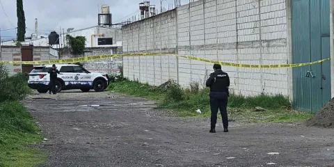 Encuentran dos cuerpos degollados cerca del Mercado Xonaca