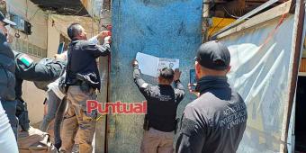 Decomisan decenas de bidones con huachicol en Tlahuapan