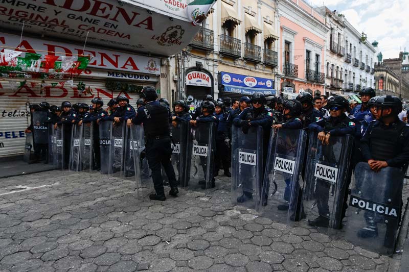 13 lesionados en operativo contra comerciantes en Puebla: uno requirió cirugía