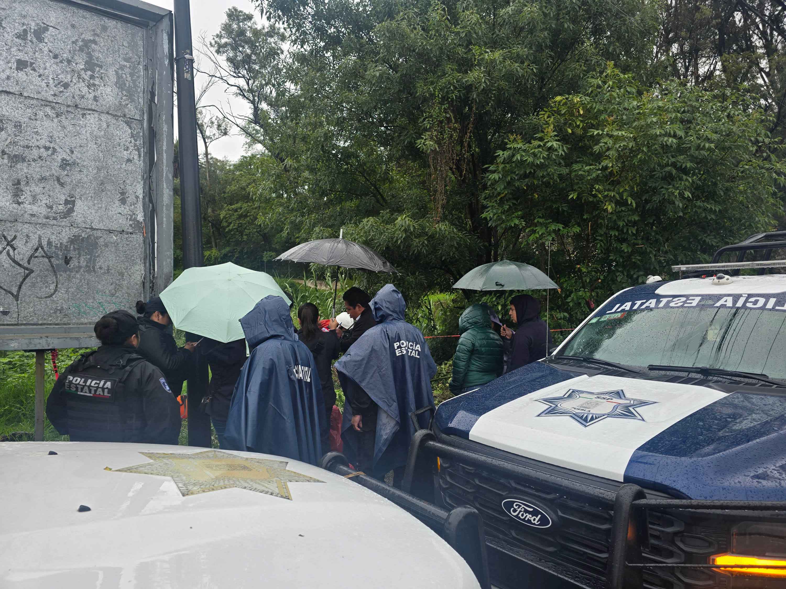 Abandonan tres cuerpos en auto en Coronango y aparece cadáver en río Alseseca