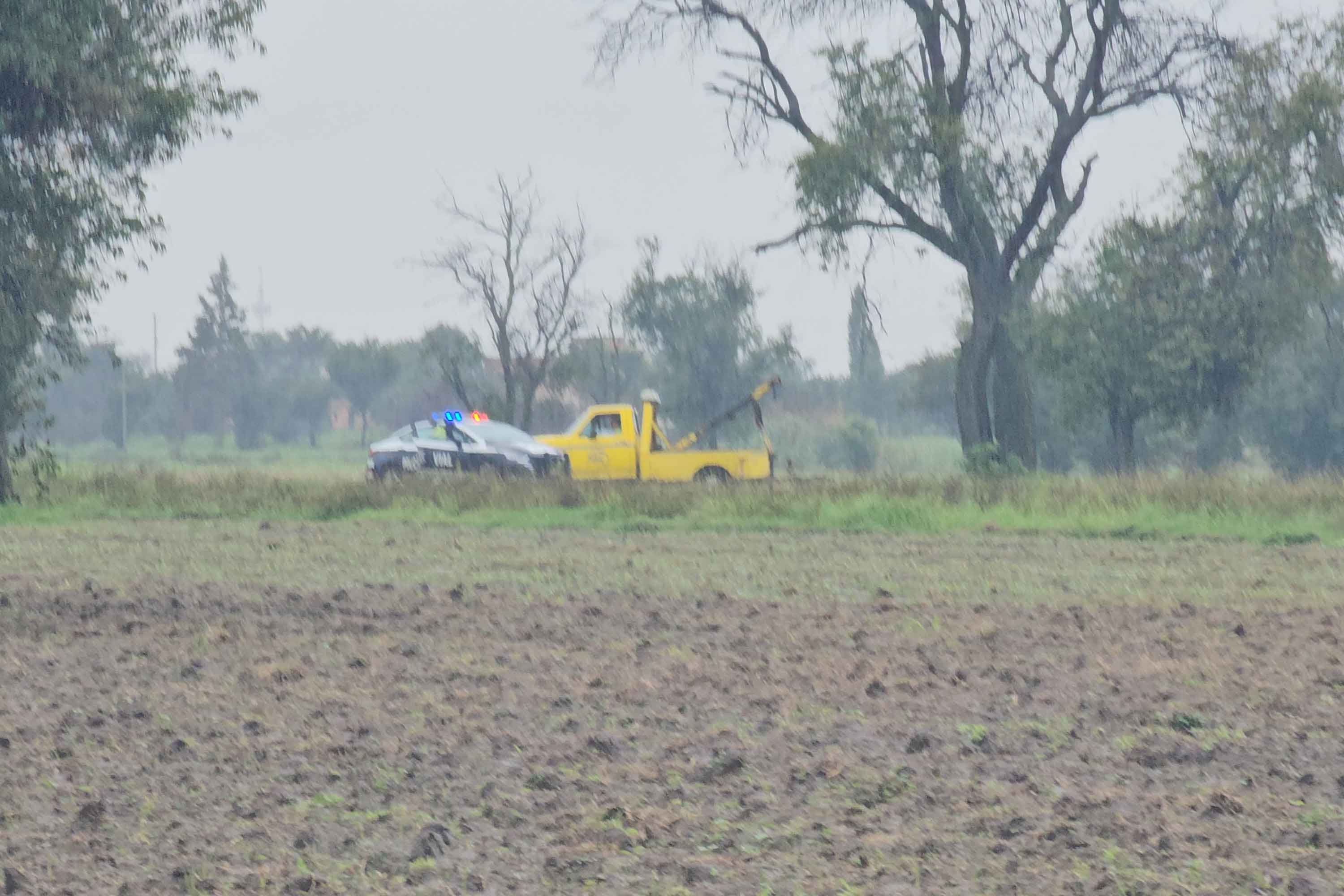 Abandonan tres cuerpos en auto en Coronango y aparece cadáver en río Alseseca
