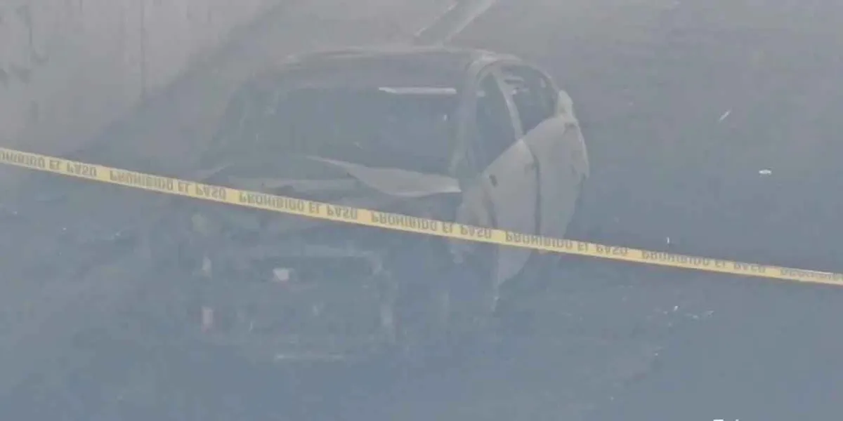 Criminales quemaron auto con cuerpo adentro sobre el Periférico