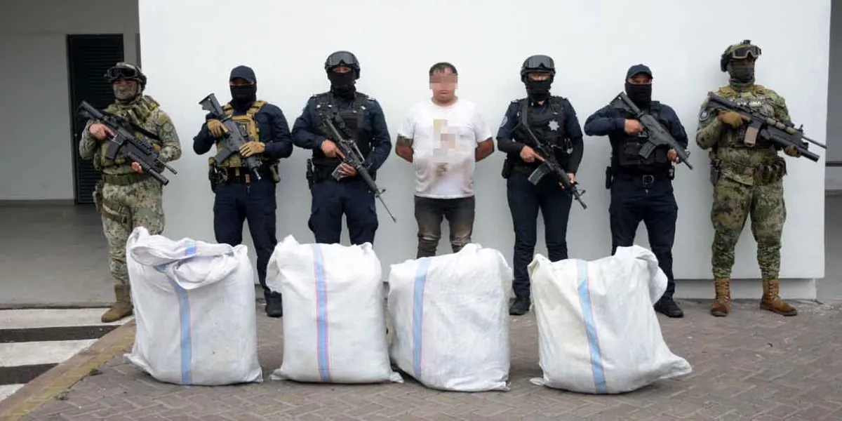 Detienen a hombre con cuatro costales llenos de marihuana en Totimehuacán