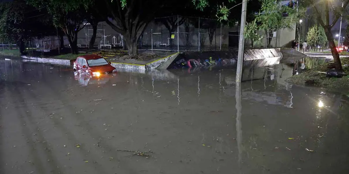 Reportan desbordamiento de laguna de San Baltazar e inundaciones en Puebla
