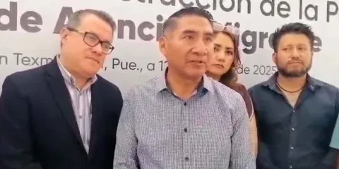 Migrantes deportados en Texmelucan trabajan y abren negocios