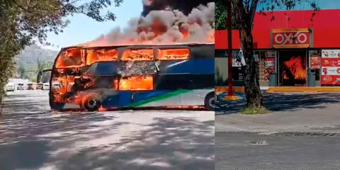Enfrentamiento entre militares y hombres armados provoca quema de vehículos y negocios en Michoacán