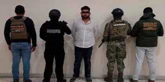 Detienen a integrante del CJNG vinculado a la quema de un auto con un hombre en el Periférico 