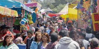 Miles de poblanos acuden al Calvario para disfrutar de la verbena