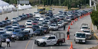 Transportistas bloquean la vía Atlixcáyotl, exigen aumento al pasaje